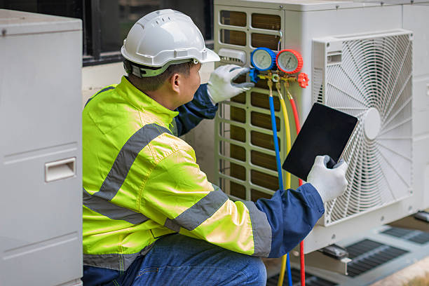 Professional Air Duct Cleaning technician working in Middle Village, NY